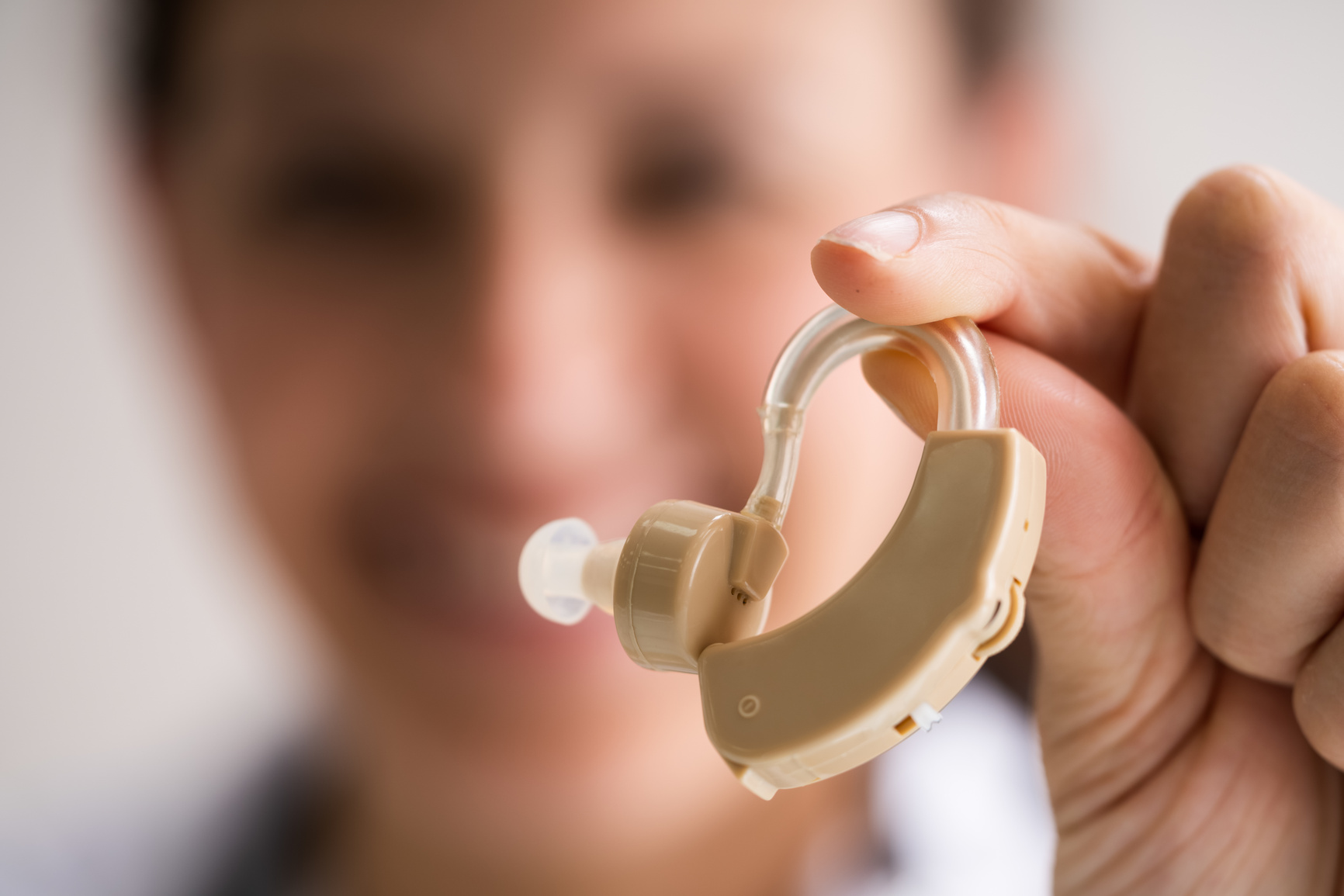 Audiologist Doctor Holding Hearing Deaf Aid